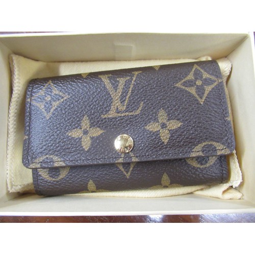 55 - Louis Vuitton leather key case in original presentation box