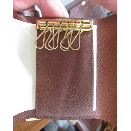 55 - Louis Vuitton leather key case in original presentation box