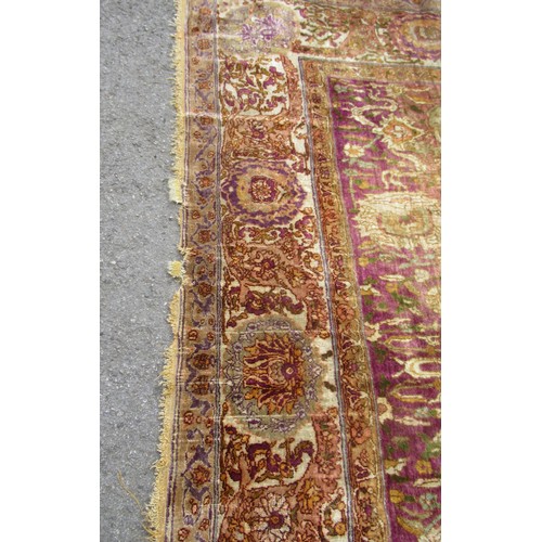 3 - Antique Kayseri rug with all over palmette and animal design on a claret ground with borders, 290 x ... 