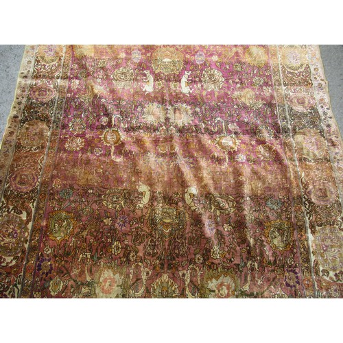 3 - Antique Kayseri rug with all over palmette and animal design on a claret ground with borders, 290 x ... 