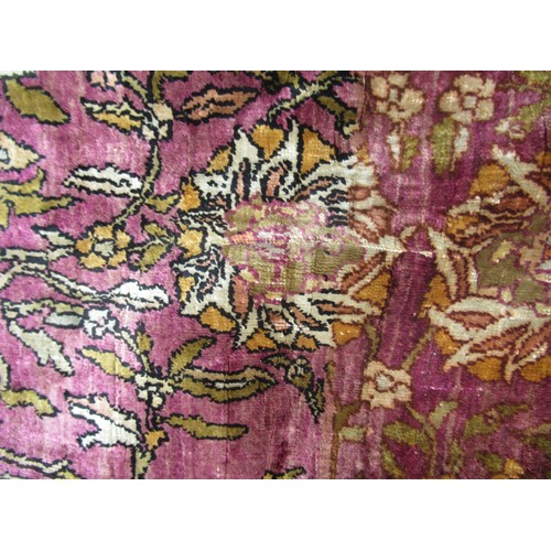 3 - Antique Kayseri rug with all over palmette and animal design on a claret ground with borders, 290 x ... 