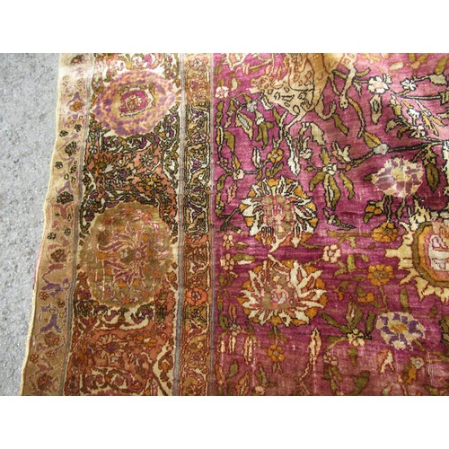 3 - Antique Kayseri rug with all over palmette and animal design on a claret ground with borders, 290 x ... 
