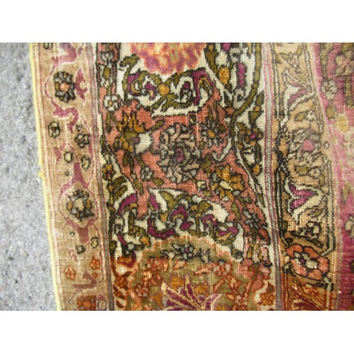 3 - Antique Kayseri rug with all over palmette and animal design on a claret ground with borders, 290 x ... 