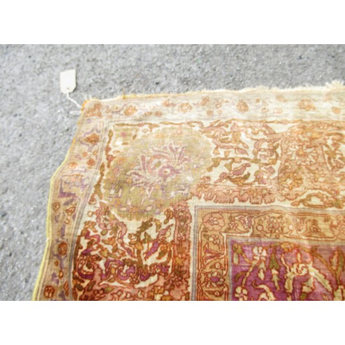 3 - Antique Kayseri rug with all over palmette and animal design on a claret ground with borders, 290 x ... 