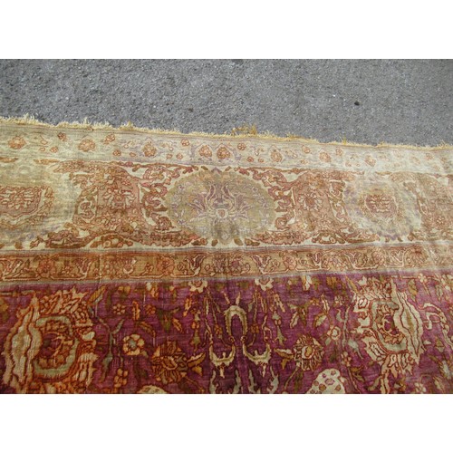3 - Antique Kayseri rug with all over palmette and animal design on a claret ground with borders, 290 x ... 