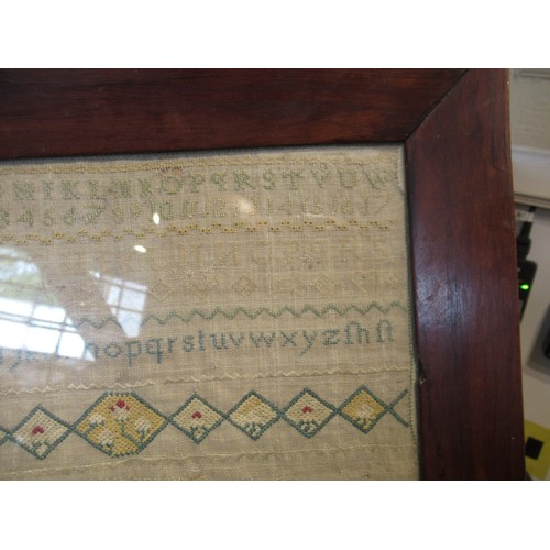 49 - Small George II woolwork sampler, dated 1747, 24cm square (with damages)
