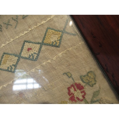 49 - Small George II woolwork sampler, dated 1747, 24cm square (with damages)