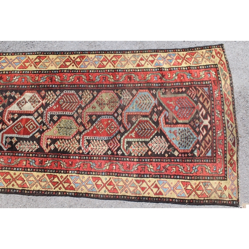 6 - Antique Kurdish runner with an all-over Boteh design, 336 x 84cm approximately (some wear)