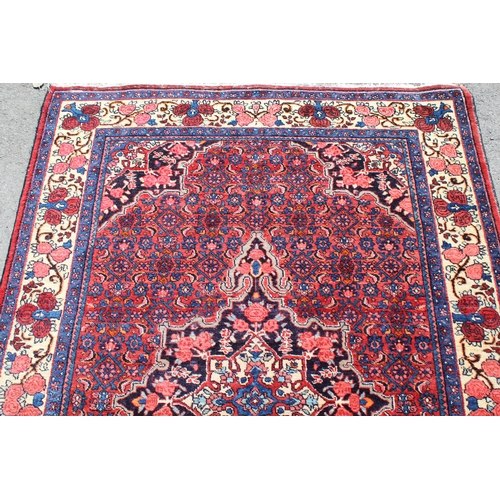 9 - Saruq rug, with medallion and all-over Herati design, 198 x 131cm