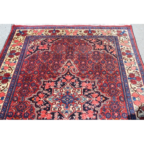9 - Saruq rug, with medallion and all-over Herati design, 198 x 131cm