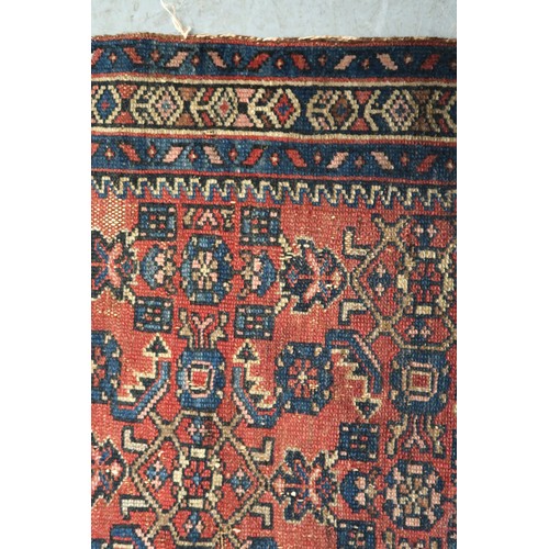 21 - Small Hamadan rug of all over floral design with borders on a wine ground, 120 x 76cm