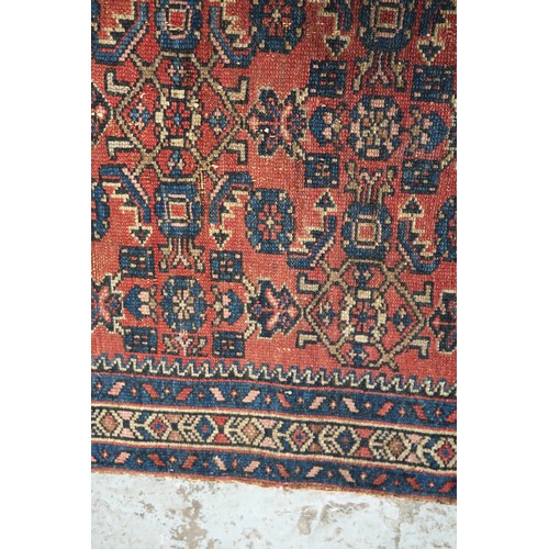 21 - Small Hamadan rug of all over floral design with borders on a wine ground, 120 x 76cm