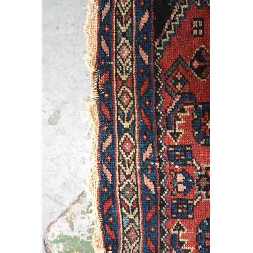 21 - Small Hamadan rug of all over floral design with borders on a wine ground, 120 x 76cm
