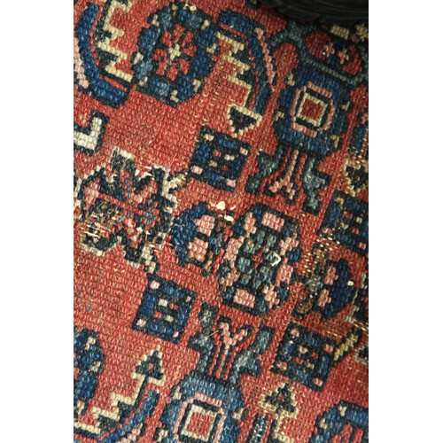 21 - Small Hamadan rug of all over floral design with borders on a wine ground, 120 x 76cm