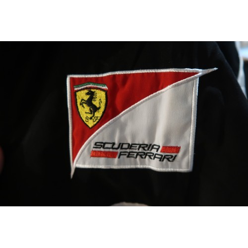 42 - Ferrari Bridgestone jacket, with advertising for Shell and UPS