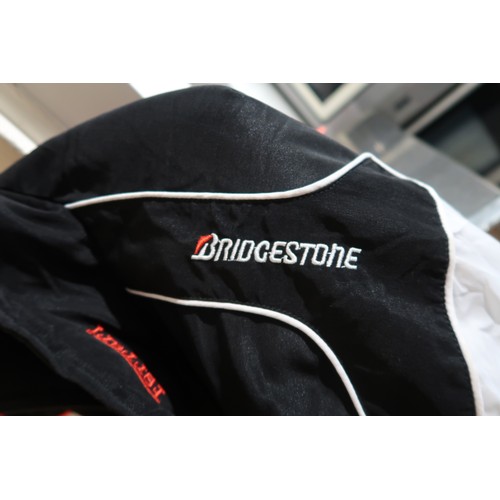 42 - Ferrari Bridgestone jacket, with advertising for Shell and UPS