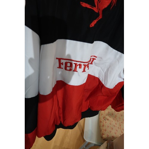 42 - Ferrari Bridgestone jacket, with advertising for Shell and UPS