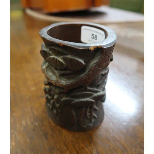 58 - Chinese carved bamboo brush pot decorated in high relief with figures and foliage, carved four chara... 