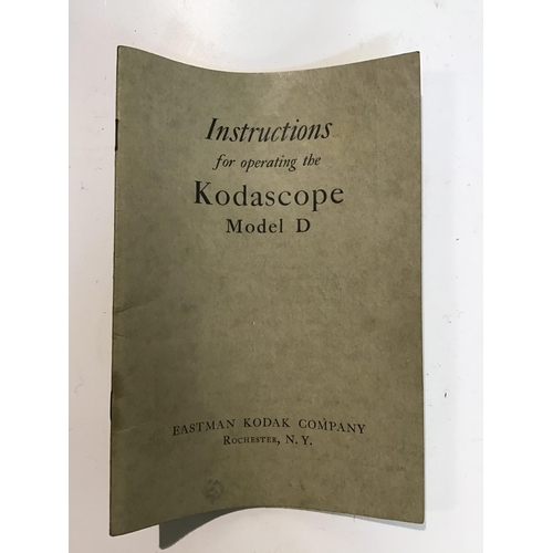 224 - Eastman Model D Kodascope. Complete with instructions, parts, wooden case and key. Box measures 23x1... 
