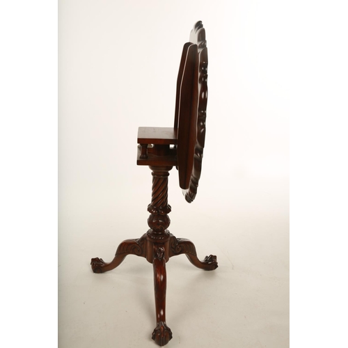 38 - A mid Victorian mahogany pie crust topped occasional table with birdcage movement; the tilt top rais... 