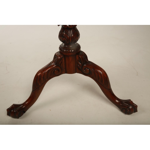 38 - A mid Victorian mahogany pie crust topped occasional table with birdcage movement; the tilt top rais... 