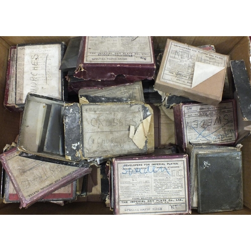 73 - A large collection of glass photographic plates, including churches, crosses, Poltreath, Sweden and ... 