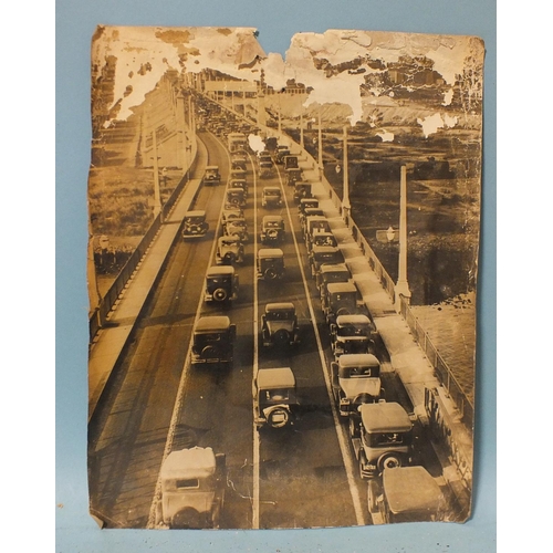 76 - Eight press photographs c1930's, including Malcolm Campbell's Bluebird ready for shipment to Daytona... 