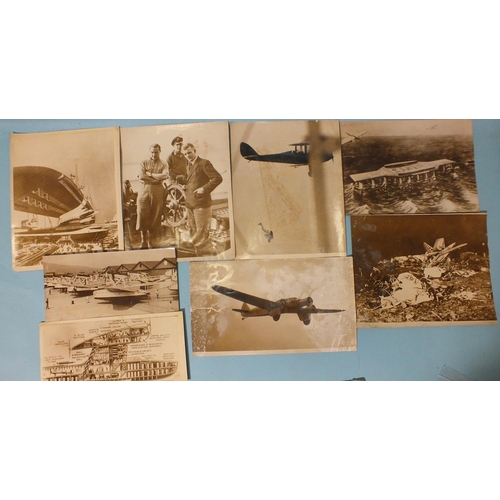 77 - Eight press photographs c1930's of aviation and shipping interest: one of an artist's impression of ... 