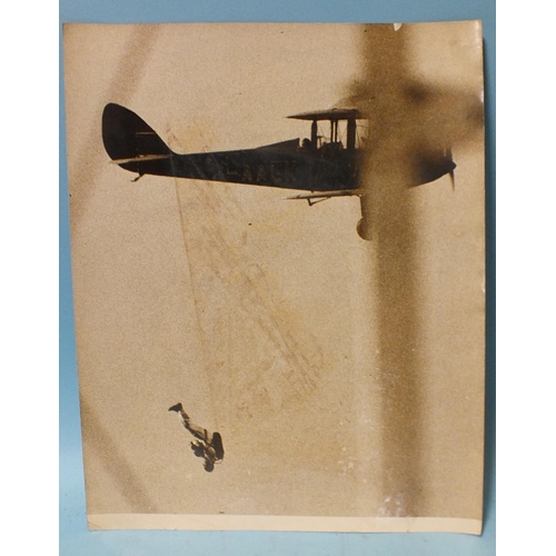 77 - Eight press photographs c1930's of aviation and shipping interest: one of an artist's impression of ... 