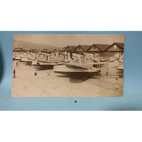 77 - Eight press photographs c1930's of aviation and shipping interest: one of an artist's impression of ... 