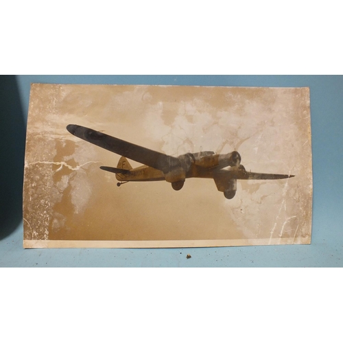 77 - Eight press photographs c1930's of aviation and shipping interest: one of an artist's impression of ... 