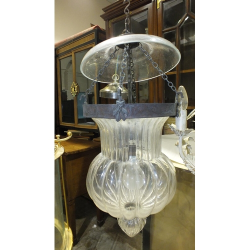 106 - A shaped moulded hanging glass light fitting, with glass smut cover, 52cm high.