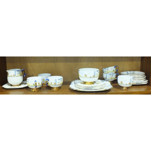 117 - A Carlton China 'Sylvan' decorated tea part-service comprising six cups and saucers, five sandwich p... 