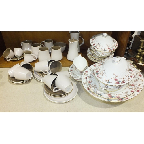 118 - Approximately thirty-five pieces of Poole two-tone chocolate-coloured tea ware, (undamaged), a colle... 