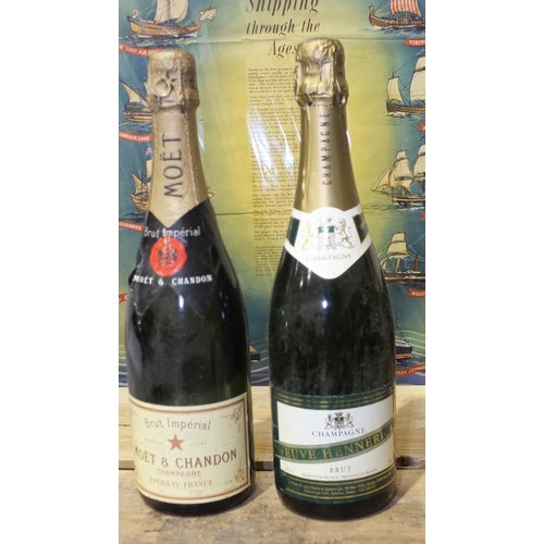 128 - A bottle of Moët et Chandon Brut Imperial Champagne, 75cl, 12% and a bottle of Veuve Hennerick Brut ... 