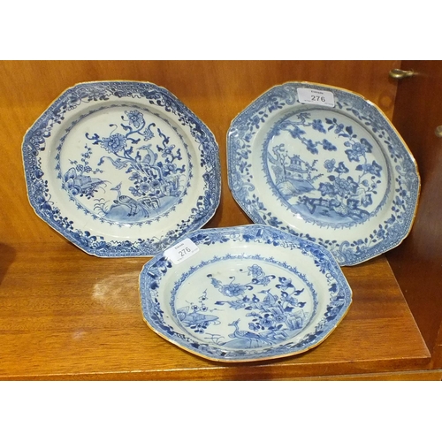 132 - Three 19th century Chinese blue and white octagonal dishes decorated with birds and flowers, 21.5cm ... 