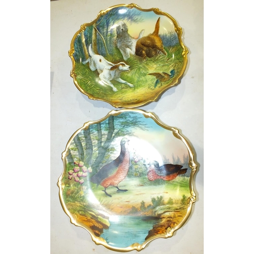 149 - A pair of Austrian decorative wall plates decorated with game birds and hunting dogs, 30cm and a pai... 