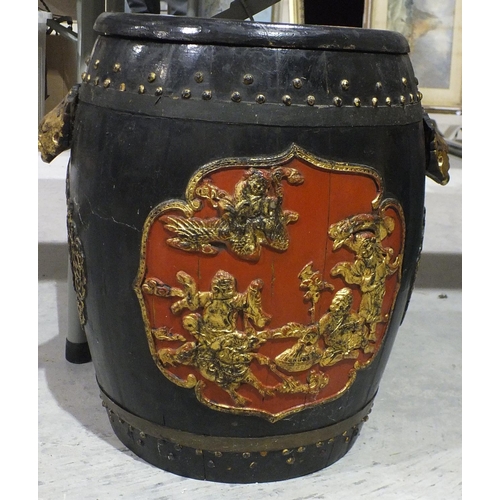 175 - A Chinese wooden barrel-shaped container, metal-bound and studded, decorated with panels of figures,... 