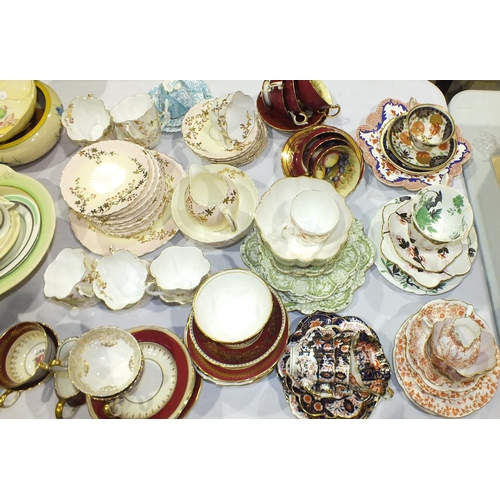 183 - A collection of early-20th century porcelain tea sets, Shelley, Aynsley, etc, (some damages).