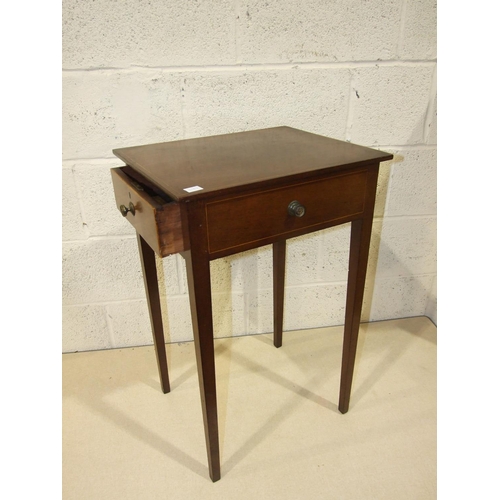 63 - A 19th century small mahogany centre table with a frieze drawer and three fake drawers, on square ta... 