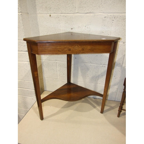 64 - An Edwardian inlaid rosewood corner table on square tapered legs with serpentine under-tier, 65cm wi... 