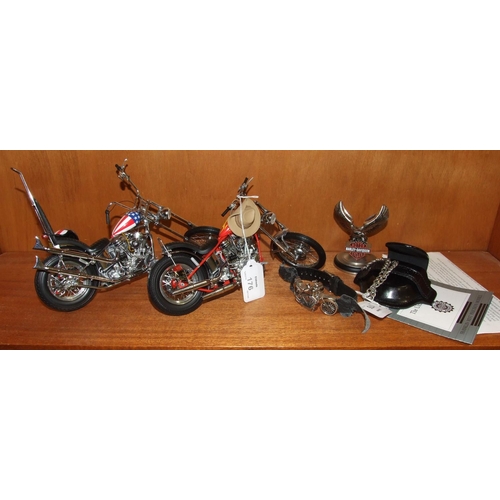 176 - Two Franklin Mint Harley Davidson Chopper motorbike models and other Harley Davidson items.