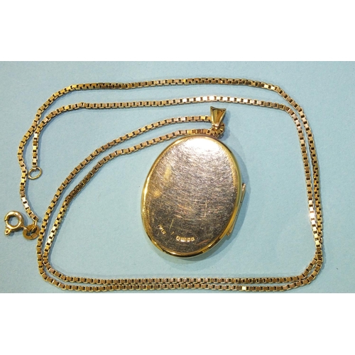 287 - A modern 9ct gold oval locket pendant on 9ct gold box-link chain, 59.5cm long, gross weight 17.9g.