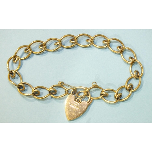 290 - A 9ct gold fancy-link bracelet with padlock clasp, 15g.