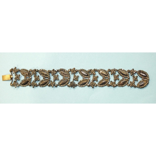 305 - A Georgian cut-steel bracelet, (two links detached, some rust), 18.5cm.