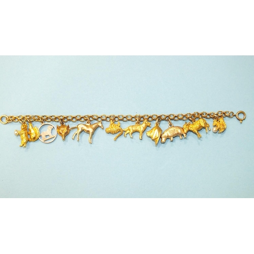 309 - An unmarked gold fancy-link bracelet with eleven 9ct gold charms, all animals, chain length 16cm, 28... 