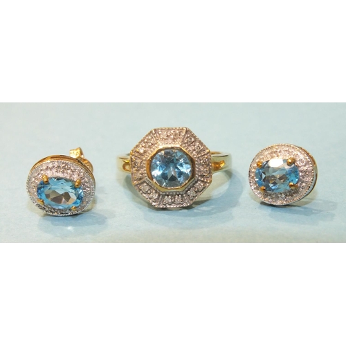 312 - A 9ct gold ring set blue topaz and diamond point octagonal cluster ring, size J and a pair of simila... 