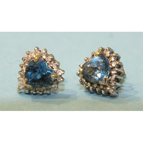 316 - A pair of blue topaz and diamond heart-shaped cluster earrings, with 9ct gold mounts, 2.6g, (boxed).