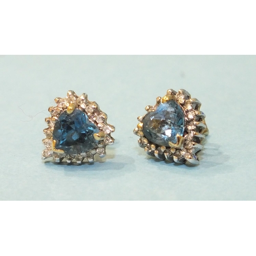 316 - A pair of blue topaz and diamond heart-shaped cluster earrings, with 9ct gold mounts, 2.6g, (boxed).