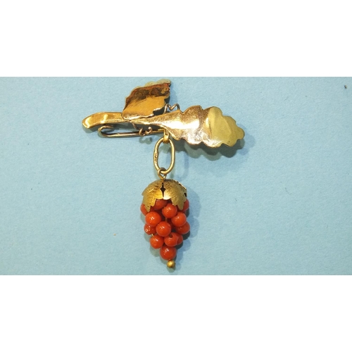 321 - A small gold brooch in the form of leaves, with gilt metal-mounted coral grape bunch below, a pair o... 